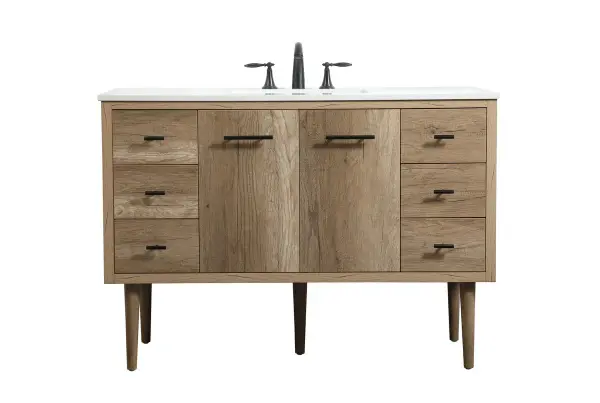 Delve into a world of minimalistic fashion and contemporary styling with this midcentury modern vanity. The clean lines anchors the design, while the straight tapered cylinder legs add subtle interest. Bar pull handle adorns the soft closing door hiding the base of the rectangular porcelain sink and letting you store your bathroom necessities and toiletries. Six soft closing drawers add plenty of storage option. Whether you want to use this as a floating vanity or a freestanding vanity, the choice is yours. The durable ivory white engineered marble countertop complements the manufactured wood base vanity and is built to last. Collection: Cyrus Rooms: bathroom Finish: Natural oak Width: 22.00" Height: 33.50" Length: 48.00" Weight: 175.00 lb Material: Solid wood and MDF Country of Origin: Vietnam Manufacturer Warranty: 1 year limited