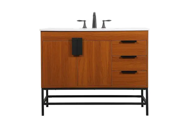 This vanity is a sleek-looking piece of bathroom furniture that is easy to incorporate into your design scheme. The cabinet features a smooth door panel with an oversized steel handle and soft close hinges provide ample room for accessories. Constructed of engineered wood, the powder-coated metal rod legs are an urban industrial look that we love. Minor assembly of the metal legs needed to get this vanity up and running. Collection: Eugene Rooms: bathroom Finish: Teak Width: 22.00" Height: 33.50" Length: 42.00" Weight: 147.00 lb Material: MDF Country of Origin: Vietnam Manufacturer Warranty: 1 year limited