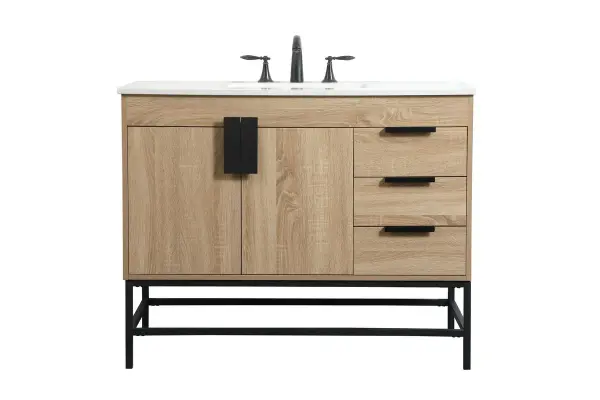 This vanity is a sleek-looking piece of bathroom furniture that is easy to incorporate into your design scheme. The cabinet features a smooth door panel with an oversized steel handle and soft close hinges provide ample room for accessories. Constructed of engineered wood, the powder-coated metal rod legs are an urban industrial look that we love. Minor assembly of the metal legs needed to get this vanity up and running. Collection: Eugene Rooms: bathroom Finish: mango wood Width: 22.00" Height: 33.50" Length: 42.00" Weight: 147.00 lb Material: MDF Country of Origin: Vietnam Manufacturer Warranty: 1 year limited