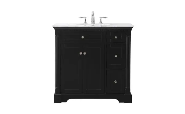 Make the most of your space with this traditional style bathroom vanity. Its traditional style is able to complement many aesthetics, natural marble countertop, and the round brushed nickel knobs that sits above the soft closing doors, allowing you to store an assortment of bathroom essentials. The lower shelf makes it the perfect space to hold new towels for your guests. This compact vanity ensures both form and function in your bathroom or powder room for you and your guests. Collection: Clarence Rooms: bathroom Finish: black Width: 21.50" Height: 35.00" Length: 36.00" Weight: 142.00 lb Material: Solid wood and MDF Country of Origin: Vietnam Manufacturer Warranty: 1 year limited