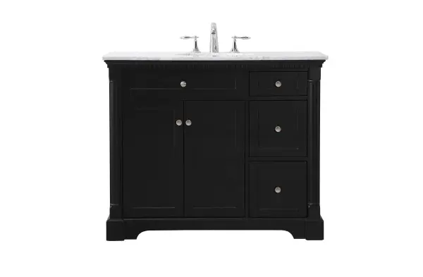 Make the most of your space with this traditional style bathroom vanity. Its traditional style is able to complement many aesthetics, natural marble countertop, and the round brushed nickel knobs that sits above the soft closing doors, allowing you to store an assortment of bathroom essentials. The lower shelf makes it the perfect space to hold new towels for your guests. This compact vanity ensures both form and function in your bathroom or powder room for you and your guests. Collection: Clarence Rooms: bathroom Finish: black Width: 21.50" Height: 35.00" Length: 42.00" Weight: 163.00 lb Material: Solid wood and MDF Country of Origin: Vietnam Manufacturer Warranty: 1 year limited