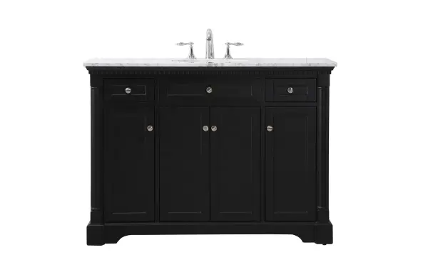 Make the most of your space with this traditional style bathroom vanity. Its traditional style is able to complement many aesthetics, natural marble countertop, and the round brushed nickel knobs that sits above the soft closing doors, allowing you to store an assortment of bathroom essentials. The lower shelf makes it the perfect space to hold new towels for your guests. This compact vanity ensures both form and function in your bathroom or powder room for you and your guests. Collection: Clarence Rooms: bathroom Finish: black Width: 21.50" Height: 35.00" Length: 48.00" Weight: 182.00 lb Material: Solid wood and MDF Country of Origin: Vietnam Manufacturer Warranty: 1 year limited