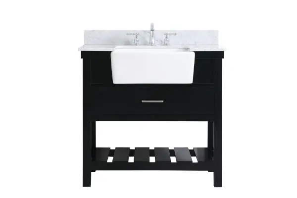 Make the most of your space with this farmhouse style bathroom vanity. Complements well with its beautiful finish, carrara white marble countertop, and the contemporary slender handle bar that sits on the functional drawers with soft closing mechanism, allowing you to store an assortment of bathroom essentials. The lower shelf makes it the perfect space to hold new towels for your guests. This stylish vanity ensures both form and function in your bathroom for you and your guests. Collection: Clement Rooms: bathroom Finish: black Width: 22.00" Height: 34.13" Length: 36.00" Weight: 152.00 lb Material: Solid wood and MDF Country of Origin: Vietnam Manufacturer Warranty: 1 year limited