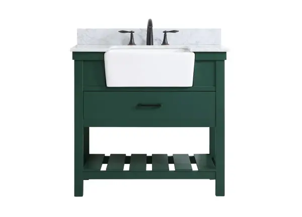 Make the most of your space with this farmhouse style bathroom vanity. Complements well with its beautiful finish, carrara white marble countertop, and the contemporary slender handle bar that sits on the functional drawers with soft closing mechanism, allowing you to store an assortment of bathroom essentials. The lower shelf makes it the perfect space to hold new towels for your guests. This stylish vanity ensures both form and function in your bathroom for you and your guests. Collection: Clement Rooms: bathroom Finish: green Width: 22.00" Height: 34.13" Length: 36.00" Weight: 152.00 lb Material: Solid wood and MDF Country of Origin: Vietnam Manufacturer Warranty: 1 year limited