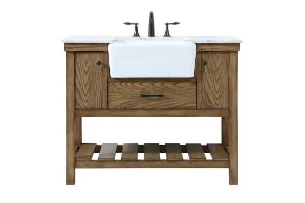 Make the most of your space with this farmhouse style bathroom vanity. Complements well with its beautiful finish, carrara white marble countertop, and the contemporary slender handle bar that sits on the functional drawers with soft closing mechanism, allowing you to store an assortment of bathroom essentials. The lower shelf makes it the perfect space to hold new towels for your guests. This stylish vanity ensures both form and function in your bathroom for you and your guests. Collection: Clement Rooms: bathroom Finish: driftwood Width: 22.00" Height: 34.13" Length: 42.00" Weight: 165.00 lb Material: Solid wood and MDF Country of Origin: Vietnam Manufacturer Warranty: 1 year limited