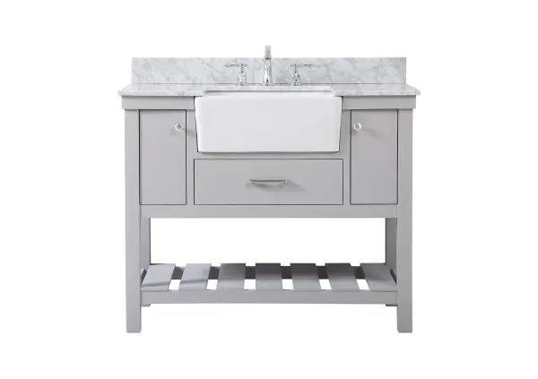 Make the most of your space with this farmhouse style bathroom vanity. Complements well with its beautiful finish, carrara white marble countertop, and the contemporary slender handle bar that sits on the functional drawers with soft closing mechanism, allowing you to store an assortment of bathroom essentials. The lower shelf makes it the perfect space to hold new towels for your guests. This stylish vanity ensures both form and function in your bathroom for you and your guests. Collection: Clement Rooms: bathroom Finish: grey Width: 22.00" Height: 34.13" Length: 42.00" Weight: 175.00 lb Material: Solid wood and MDF Country of Origin: Vietnam Manufacturer Warranty: 1 year limited