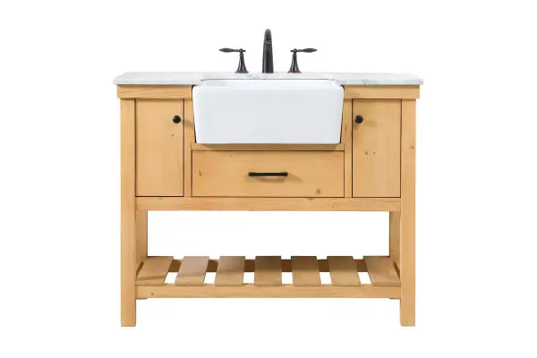 Make the most of your space with this farmhouse style bathroom vanity. Complements well with its beautiful finish, carrara white marble countertop, and the contemporary slender handle bar that sits on the functional drawers with soft closing mechanism, allowing you to store an assortment of bathroom essentials. The lower shelf makes it the perfect space to hold new towels for your guests. This stylish vanity ensures both form and function in your bathroom for you and your guests. Collection: Clement Rooms: bathroom Finish: natural wood Width: 22.00" Height: 34.13" Length: 42.00" Weight: 165.00 lb Material: Solid wood and MDF Country of Origin: Vietnam Manufacturer Warranty: 1 year limited