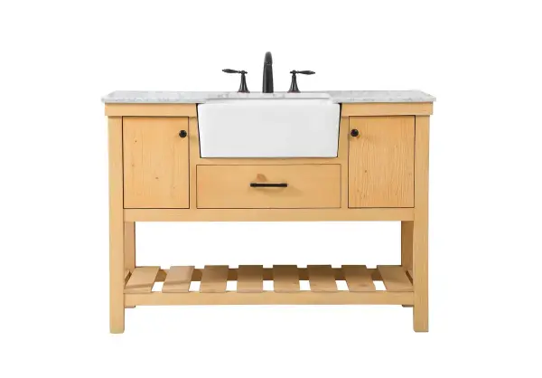 Make the most of your space with this farmhouse style bathroom vanity. Complements well with its beautiful finish, carrara white marble countertop, and the contemporary slender handle bar that sits on the functional drawers with soft closing mechanism, allowing you to store an assortment of bathroom essentials. The lower shelf makes it the perfect space to hold new towels for your guests. This stylish vanity ensures both form and function in your bathroom for you and your guests. Collection: Clement Rooms: bathroom Finish: natural wood Width: 22.00" Height: 34.13" Length: 48.00" Weight: 185.00 lb Material: Solid wood and MDF Country of Origin: Vietnam Manufacturer Warranty: 1 year limited