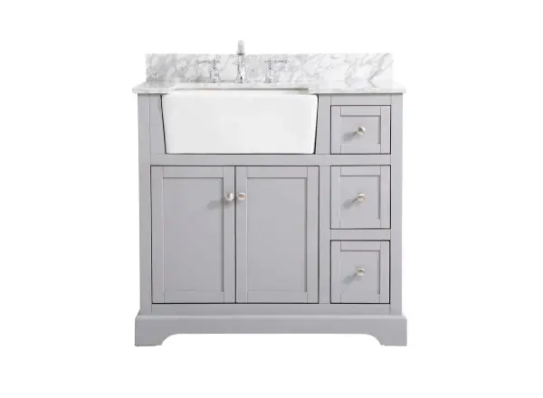Make the most of your space with this farmhouse style bathroom vanity. Complements well with its beautiful finish, carrara white marble countertop, and the contemporary slender handle bar that sits on the functional drawers with soft closing mechanism, allowing you to store an assortment of bathroom essentials. The lower shelf makes it the perfect space to hold new towels for your guests. This stylish vanity ensures both form and function in your bathroom for you and your guests. Comes with a matching backsplash to complete the look and protects your wall. Collection: Franklin Rooms: bathroom Finish: grey Width: 22.00" Height: 34.75" Length: 36.00" Weight: 183.00 lb Material: Solid wood and MDF Country of Origin: Vietnam Manufacturer Warranty: 1 year limited