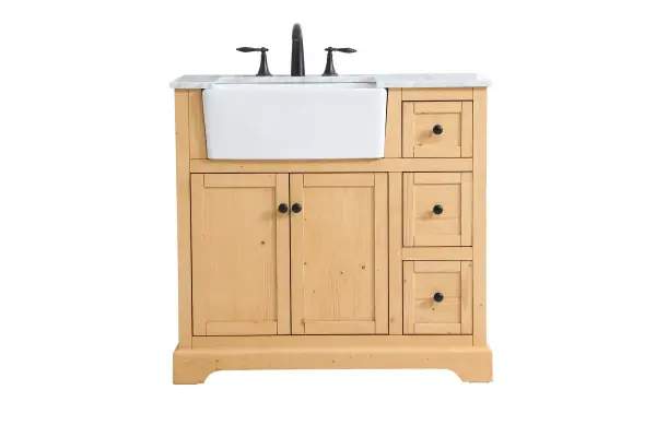 Make the most of your space with this farmhouse style bathroom vanity. Complements well with its beautiful finish, carrara white marble countertop, and the contemporary slender handle bar that sits on the functional drawers with soft closing mechanism, allowing you to store an assortment of bathroom essentials. The lower shelf makes it the perfect space to hold new towels for your guests. This stylish vanity ensures both form and function in your bathroom for you and your guests. Collection: Franklin Rooms: bathroom Finish: natural wood Width: 22.00" Height: 34.75" Length: 36.00" Weight: 174.00 lb Material: Solid wood and MDF Country of Origin: Vietnam Manufacturer Warranty: 1 year limited