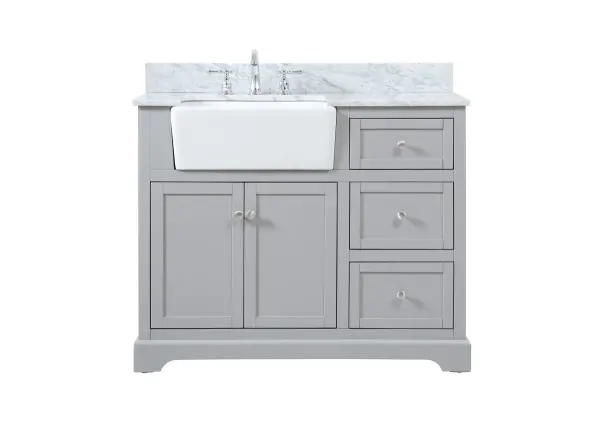 Make the most of your space with this farmhouse style bathroom vanity. Complements well with its beautiful finish, carrara white marble countertop, and the contemporary slender handle bar that sits on the functional drawers with soft closing mechanism, allowing you to store an assortment of bathroom essentials. The lower shelf makes it the perfect space to hold new towels for your guests. This stylish vanity ensures both form and function in your bathroom for you and your guests. Comes with a matching backsplash to complete the look and protects your wall. Collection: Franklin Rooms: bathroom Finish: grey Width: 22.00" Height: 34.75" Length: 42.00" Weight: 204.00 lb Material: Solid wood and MDF Country of Origin: Vietnam Manufacturer Warranty: 1 year limited