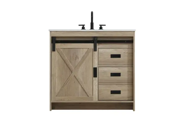 Transform your bathroom with this rustic barnyard-style vanity, designed to balance aesthetic appeal and functionality. Featuring a sliding barn door with black metal hardware and complementary handle pulls, this piece blends rugged charm with practical design. The engineered marble countertop displays unique marbling, while the porcelain undermount sink offers easy maintenance and durability. Available in Espresso, Natural Oak, and Rustic Grey finishes, this vanity suits a range of styles. It includes a deep storage drawer for larger items, a hidden shelf for towels or décor, and adjustable foot levelers for added stability on uneven floors. With pre-drilled faucet holes for easy setup, this vanity delivers style and substance to enhance your bathroom. Collection: Austin Rooms: bathroom Finish: Natural Oak Width: 36.00" Height: 22.00" Length: 36.00" Weight: 147.00 lb Material: MDF Country of Origin: Malaysia Manufacturer Warranty: 1 year limited