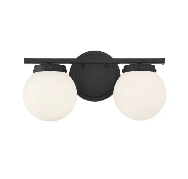 Add a bubbly look to your bath with this Meridian 2-light bath bar! Its streamlined design features globes of opal glass, a shape that is echoed in the circular backplate. This light will really pop in bathrooms with contemporary, modern and midcentury modern styles. Finished in matte black, it is also damp area rated. This bath light is 8" in height and 16" in width. It extends 7.25" from the wall and can be mounted with the shades facing up or down. It uses 2 candelabra size bulbs of up to 60 watts each, is dimmable and is LED compatible. Rooms: Bathroom, Powder Room Finish: Matte Black Glass: White Opal Width: 16.00" Height: 8.00" Weight: 2.86 lb Extension from Wall: 7.25" Canopy: 6"x0.75" Number of Bulbs: 2 Maximum Wattage: 60.00 W Bulb Type: C11 Bulb Base: E12 Light Source: Incandescent/LED Dimmable Voltage: 120.00 V Material: Metal, Glass Safety Listing: UL/CUL Safety Rating: Damp LED