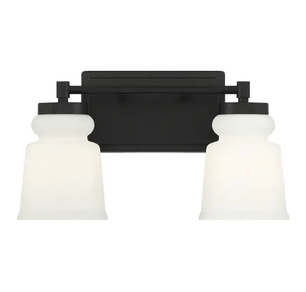Simply stylish and cleanly classic, this Meridian 2-light bath vanity bar showcases vintage-inspired shades of milk glass and a matte black finish for bright yet comfortable illumination. 8.5" height, 14.5" width, extends 6" from wall. Max 60 watts per bulb, standard size A19 bulbs recommended. LED bulb compatible. Damp area rated. Rooms: Bathroom, Powder Room Finish: Matte Black Glass: Milk Width: 14.50" Height: 8.50" Weight: 2.97 lb Extension from Wall: 6.00" Canopy: 4.5"x8"x0.75" Number of Bulbs: 2 Maximum Wattage: 60.00 W Bulb Type: A-19 Bulb Base: E26 Light Source: Incandescent/LED Dimmable Voltage: 120.00 V Material: Metal, Glass Safety Listing: UL/CUL Safety Rating: Damp LED