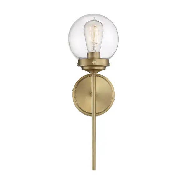 Get industrial with this bold 1-light sconce, offering a long arm, an orb-shaped shade of clear glass and a Natural Brass finish. 18" in height and 6" in width. Extends 6.88" from the wall. Collection: Mscon Rooms: Bathroom, Bedroom, Billiard Room, Closet, Dining Room, Entryway, Family Room, Great Room, Kitchen, Hallway, Living Room, Office, Powder Room, Stairway, Sunroom, Lobby, Waiting Room, Media Room Finish: Natural Brass Glass: Clear Width: 6.00" Height: 18.00" Weight: 6.16 lb Extension from Wall: 6.88" Canopy: 5"x5"x0.75" Number of Bulbs: 1 Maximum Wattage: 60.00 W Bulb Type: A19 Bulb Base: E26 Light Source: Incandescent/LED Dimmable Voltage: 120.00 V Material: Metal, Glass Safety Listing: UL/CUL Safety Rating: Damp LED