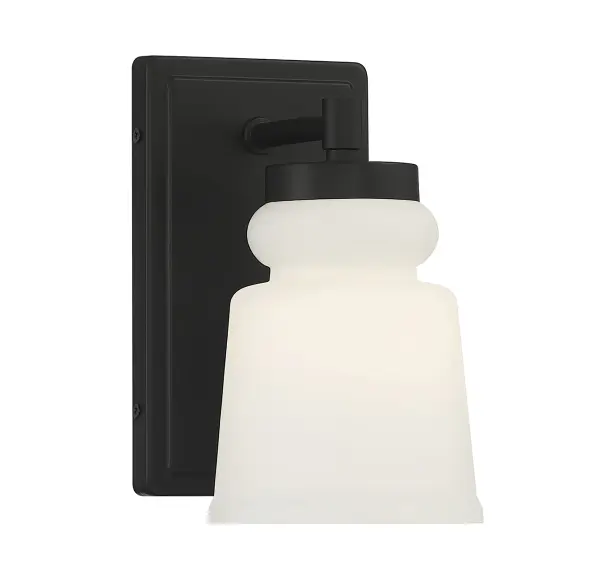 Simply stylish and cleanly classic, this Meridian 1-light wall sconce showcases a vintage-inspired shade of milk glass and a matte black finish for bright yet comfortable illumination. Perfect for use in groupings or solo. 8.5" height, 5" width, extends 6" from wall. Max 60 watt bulb, standard size A19 bulb recommended. LED bulb compatible. Damp area rated. Rooms: Bathroom, Bedroom, Billiard Room, Closet, Dining Room, Entryway, Family Room, Great Room, Kitchen, Hallway, Living Room, Office, Powder Room, Stairway, Sunroom, Lobby, Waiting Room, Media Room Finish: Matte Black Glass: Milk Width: 5.00" Height: 8.50" Weight: 1.76 lb Extension from Wall: 6.00" Canopy: 8"x4.5"x0.75" Number of Bulbs: 1 Maximum Wattage: 60.00 W Bulb Type: A-19 Bulb Base: E26 Light Source: Incandescent/LED Dimmable Voltage: 120.00 V Material: Metal, Glass Safety Listing: UL/CUL Safety Rating: Damp LED