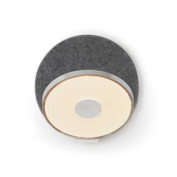 The Gravy LED Wall Sconce combines minimalist design with exceptional functionality. Its fully articulating arm and swiveling shade allow precise light direction for reading, ambient, or task lighting. Touch-sensitive dimming and premium felt finish elevate this compact fixture above standard wall sconces.