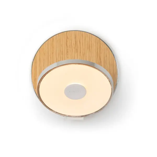 The Gravy LED Wall Sconce combines minimalist design with exceptional functionality. Its fully articulating joint allows precise light direction for ambient or task lighting, while touch controls make operation effortless. The chrome and white oak finish pairing adds warmth to the modern aesthetic.