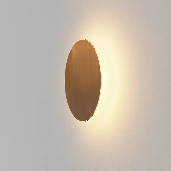 The Ramen LED Wall Sconce combines modern design with practical versatility. Its 9-inch circular form delivers 360° diffused light while magnetic face plates allow easy customization to match any decor. Wet-rated for indoor or outdoor use.