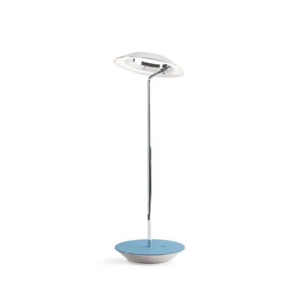 The Royyo Desk lamp adds an elegant flair to any space with its minimal wiring and pleasing circular design. Its minimal silhouette houses complex inner technology for a marriage of form and functionality. Royyo's embedded USB port allows users to charge any USB - compatible device. Interchangeable base plate options allow users to customize at ease. Achieve unity in design by inviting the Royyo Floor Lamp, Royyo Pendant and Royyo Desk Lamp into your home. Collection: Royyo Designer: Kenneth Ng, Edmund Ng Finish: Chrome, Azure Felt Width: 6.40" Height: 17.40" Length: 6.40" Weight: 2.60 lb Bulbs Included Maximum Wattage: 11.00 W Bulb Type: LED Bulb Base: Integrated Light Source: LED Light Output: 600.00 lm Color Temperature: 3000 K CRI: 90 Voltage: 120.00 V Material: Aluminum, plastic Country of Origin: China Safety Listing: UL, CUL Safety Rating: Damp LED Manufacturer Warranty: 5 years Spec Sheet