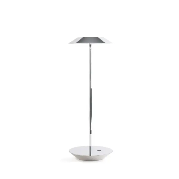 The Royyo Desk lamp adds an elegant flair to any space with its minimal wiring and pleasing circular design. Its minimal silhouette houses complex inner technology for a marriage of form and functionality. Royyo's embedded USB port allows users to charge any USB - compatible device. Interchangeable base plate options allow users to customize at ease. Achieve unity in design by inviting the Royyo Floor Lamp, Royyo Pendant and Royyo Desk Lamp into your home. Collection: Royyo Designer: Kenneth Ng, Edmund Ng Finish: Chrome Width: 6.40" Height: 17.40" Length: 6.40" Weight: 2.60 lb Bulbs Included Maximum Wattage: 11.00 W Bulb Type: LED Bulb Base: Integrated Light Source: LED Light Output: 600.00 lm Color Temperature: 3000 K CRI: 90 Voltage: 120.00 V Material: Aluminum, plastic Country of Origin: China Safety Listing: UL, CUL Safety Rating: Damp LED Manufacturer Warranty: 5 years Spec Sheet
