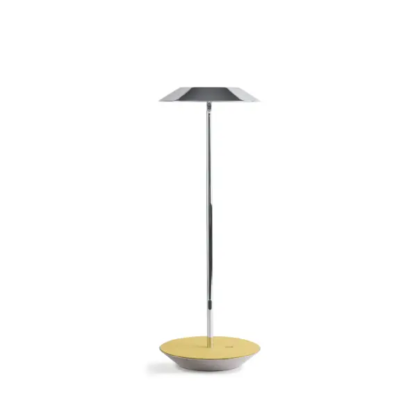 The Royyo Desk lamp adds an elegant flair to any space with its minimal wiring and pleasing circular design. Its minimal silhouette houses complex inner technology for a marriage of form and functionality. Royyo's embedded USB port allows users to charge any USB - compatible device. Interchangeable base plate options allow users to customize at ease. Achieve unity in design by inviting the Royyo Floor Lamp, Royyo Pendant and Royyo Desk Lamp into your home. Collection: Royyo Designer: Kenneth Ng, Edmund Ng Finish: Chrome, Honeydew Felt Width: 6.40" Height: 17.40" Length: 6.40" Weight: 2.60 lb Bulbs Included Maximum Wattage: 11.00 W Bulb Type: LED Bulb Base: Integrated Light Source: LED Light Output: 600.00 lm Color Temperature: 3000 K CRI: 90 Voltage: 120.00 V Material: Aluminum, plastic Country of Origin: China Safety Listing: UL, CUL Safety Rating: Damp LED Manufacturer Warranty: 5 years Spec Sheet