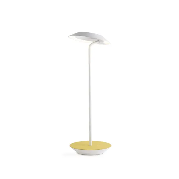 The Royyo Desk lamp adds an elegant flair to any space with its minimal wiring and pleasing circular design. Its minimal silhouette houses complex inner technology for a marriage of form and functionality. Royyo's embedded USB port allows users to charge any USB - compatible device. Interchangeable base plate options allow users to customize at ease. Achieve unity in design by inviting the Royyo Floor Lamp, Royyo Pendant and Royyo Desk Lamp into your home. Collection: Royyo Designer: Kenneth Ng, Edmund Ng Finish: Matte White, Honeydew Width: 6.40" Height: 17.40" Length: 6.40" Weight: 2.60 lb Bulbs Included Maximum Wattage: 11.00 W Bulb Type: LED Bulb Base: Integrated Light Source: LED Light Output: 600.00 lm Color Temperature: 3000 K CRI: 90 Voltage: 120.00 V Material: Aluminum, plastic Country of Origin: China Safety Listing: UL, CUL Safety Rating: Damp LED Manufacturer Warranty: 5 years Spec Sheet