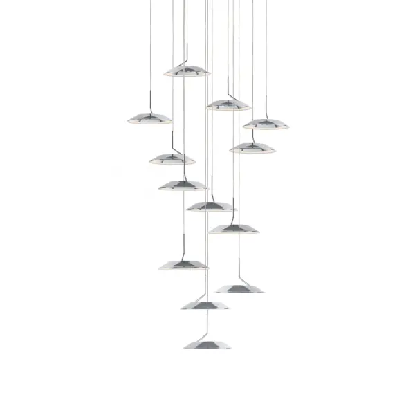 The Royyo LED Pendant delivers contemporary style with its circular aluminum design and clever concealed wiring system. At 22 inches wide, it provides focused task lighting with integrated LED technology. Ideal for modern spaces seeking clean lines and energy efficiency.