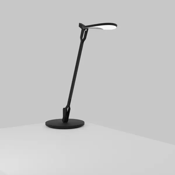 Inspired by the fluidity and formlessness of water droplets, Splitty Desk Lamp features fluid motion and ultra-flexibility. The curved, droplet shape of the LED head reflects the root this inspiration. It can be maneuvered in virtually limitless ways, making it one of the most flexible lights on the market. Koncept Inc. designers perfected the light?s diffusion, using hidden LEDs, so that the lamp performs both as a radiant, ambient light and a functional task light. The Splitty Pro features a USB-C charging port, a built-in occupancy sensor to maximize energy efficiency, and tunable light color from warm to white light. Collection: Splitty Designer: Kenneth Ng, Edmund Ng Finish: Matte Black Width: 6.50" Height: 16.75" Length: 8.20" Weight: 4.00 lb Maximum Wattage: 7.00 W Bulb Type: LED Bulb Base: Integrated Light Source: LED Light Output: 500.00 lm Color Temperature: 2700 K CRI: 90 Voltage: 120.00 V Material: Aluminum, plastic Country of Origin: Taiwan Safety Listing: UL/cUL LED Manufacturer Warranty: 5 years Spec Sheet