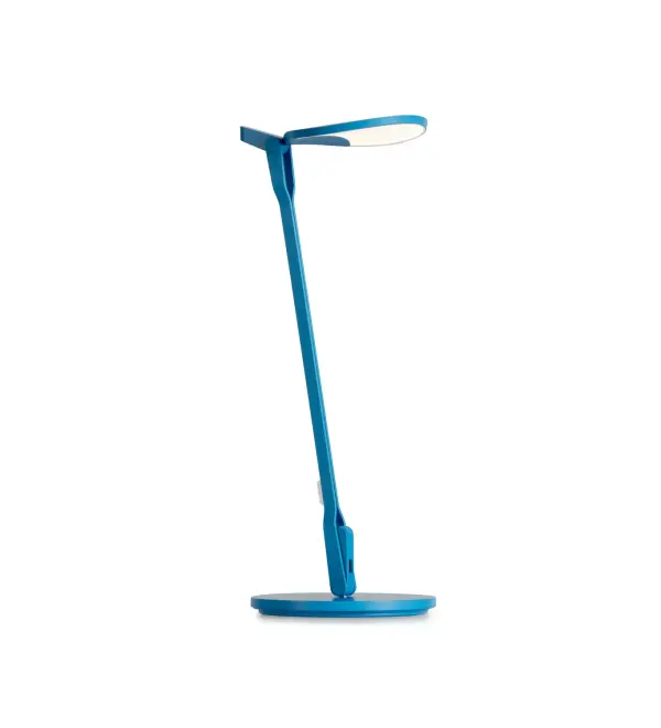 Inspired by the fluidity and formlessness of water droplets, Splitty Desk Lamp features fluid motion and ultra flexibility. The curved, droplet shape of the LED head reflects the root of its inspiration. It can be posed in virtually limitless ways, making it one of the most flexible lights on the market. Koncept designers perfected the diffused light source with hidden LEDs so that the lamp performs as a radiant ambient light as well as a functional task light. Users can avail of the discreet USB port to charge any compatible devices. Collection: Splitty Designer: Kenneth Ng, Edmund Ng Finish: Matte Pacific Blue Width: 6.50" Height: 16.05" Length: 8.20" Weight: 4.00 lb Bulbs Included Maximum Wattage: 7.00 W Bulb Type: LED Bulb Base: Integrated Light Source: LED Light Output: 500.00 lm Color Temperature: 3500 K CRI: 90 Voltage: 120.00 V Material: Aluminum, plastic Country of Origin: Taiwan Safety Listing: UL/cUL Safety Rating: Dry LED Manufacturer Warranty: 5 years Spec Sheet