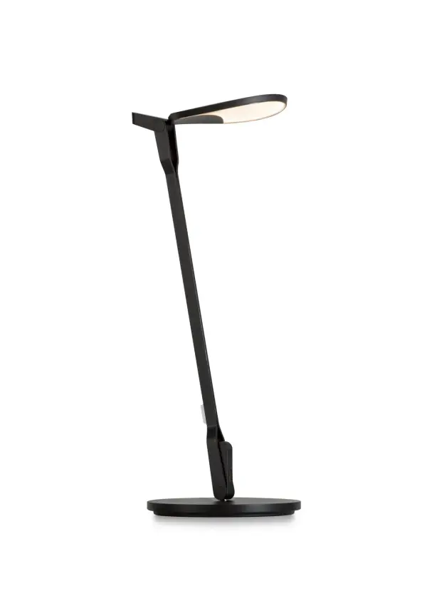 Inspired by the fluidity and formlessness of water droplets, Splitty Desk Lamp features fluid motion and ultra flexibility. The curved, droplet shape of the LED head reflects the root of its inspiration. It can be posed in virtually limitless ways, making it one of the most flexible lights on the market. Koncept designers perfected the diffused light source with hidden LEDs so that the lamp performs as a radiant ambient light as well as a functional task light. Users can avail of the discreet USB port to charge any compatible devices. Collection: Splitty Designer: Kenneth Ng, Edmund Ng Finish: Matte Black Width: 6.50" Height: 16.05" Length: 8.20" Weight: 4.00 lb Bulbs Included Maximum Wattage: 7.00 W Bulb Type: LED Bulb Base: Integrated Light Source: LED Light Output: 500.00 lm Color Temperature: 3500 K CRI: 90 Voltage: 120.00 V Material: Aluminum, plastic Country of Origin: Taiwan Safety Listing: UL/cUL Safety Rating: Dry LED Manufacturer Warranty: 5 years Spec Sheet