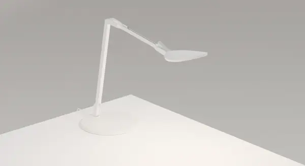 The Splitty family of task lights was inspired by the fluidity and formlessness of water droplets. The award-winning Splitty Reach offers incredible flexibility and reach due to its double arm and special joint mechanism. A USB port is located in the lower body for convenient charging options. The lamp?s diffused LED light source allows it to perform as both a radiant ambient light and functional task light. Collection: Splitty Designer: Kenneth Ng, Edmund Ng Finish: Matte White Width: 7.50" Height: 14.50" Length: 17.10" Weight: 3.70 lb Maximum Wattage: 7.00 W Bulb Type: LED Bulb Base: Integrated Light Source: LED Light Output: 500.00 lm Color Temperature: 3500 K CRI: 90 Voltage: 120.00 V Material: Aluminum, plastic Country of Origin: Taiwan Safety Listing: UL/cUL LED Manufacturer Warranty: 5 years Spec Sheet