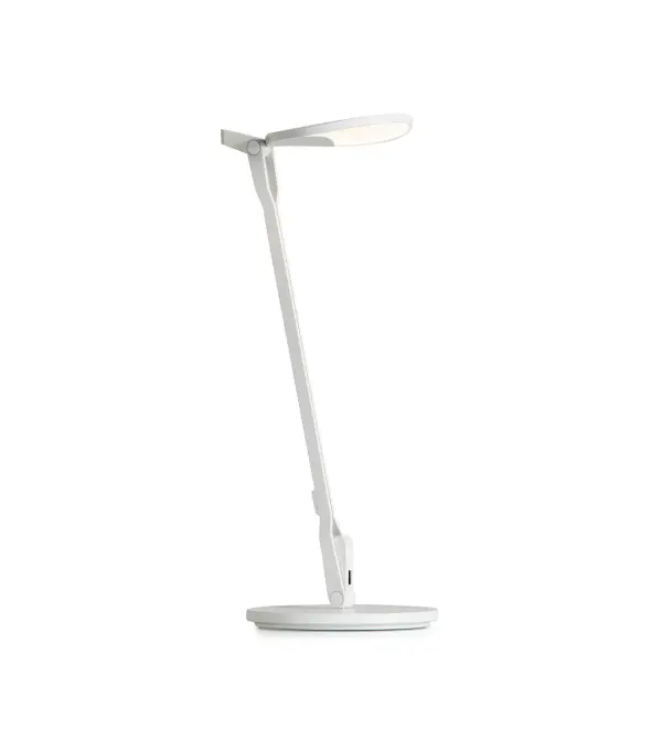 Inspired by the fluidity and formlessness of water droplets, Splitty Desk Lamp features fluid motion and ultra flexibility. The curved, droplet shape of the LED head reflects the root of its inspiration. It can be posed in virtually limitless ways, making it one of the most flexible lights on the market. Koncept designers perfected the diffused light source with hidden LEDs so that the lamp performs as a radiant ambient light as well as a functional task light. Users can avail of the discreet USB port to charge any compatible devices. Collection: Splitty Designer: Kenneth Ng, Edmund Ng Finish: Matte White Width: 6.50" Height: 16.05" Length: 8.20" Weight: 4.00 lb Bulbs Included Maximum Wattage: 7.00 W Bulb Type: LED Bulb Base: Integrated Light Source: LED Light Output: 500.00 lm Color Temperature: 3500 K CRI: 90 Voltage: 120.00 V Material: Aluminum, plastic Country of Origin: Taiwan Safety Listing: UL/cUL Safety Rating: Dry LED Manufacturer Warranty: 5 years Spec Sheet