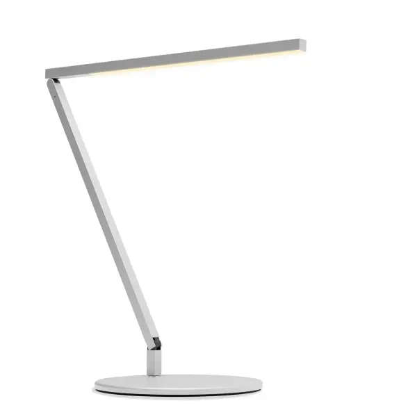 The Z-Bar Solo Gen 4 is a sleek and modern LED desk lamp designed for Minimalists who prefer a single arm articulation that provides a sleek, streamlined look while still providing versatile lighting options. The super-adjustable LED head can be positioned in any direction thanks to its ability to spin in its socket, sweep side to side and rotate around the end of the arm. With the touchstrip located near the LED head, you can easily adjust the brightness to your desired level. Whether you prefer to dim gradually or jump directly to your desired level, the touchstrip makes it easy. The Z-Bar Solo Gen 4 is perfect for any task or activity, providing the perfect lighting for any situation. Collection: Z-Bar Gen 4 Designer: Peter Ng, Keneth Ng, Edmund Ng Finish: Silver Width: 7.50" Height: 16.75" Length: 17.60" Weight: 3.20 lb Maximum Wattage: 8.80 W Bulb Type: LED Bulb Base: Integrated Light Source: LED Light Output: 888.00 lm Color Temperature: 3500 K CRI: 90 Voltage: 120.00 V Material: Aluminum, plastic Country of Origin: Taiwan Safety Listing: UL/cUL LED Manufacturer Warranty: 5 years Spec Sheet