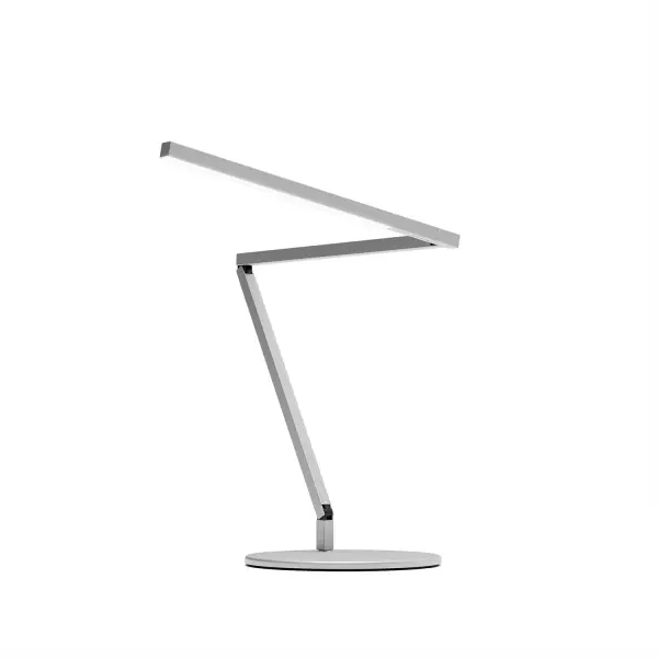 The Z-Bar Mini Gen 4 is the perfect addition to any small space, it comes in a variety of color finishes and its compact size makes it an ideal task light. Its sleek and modern design makes it a stylish addition to any room. The super-adjustable LED head can be positioned in any direction thanks to its ability to spin in its socket, sweep side to side and rotate around the end of the arm. With the touchstrip located near the LED head, you can easily adjust the brightness to your desired level. Whether you prefer to dim gradually or jump directly to your desired level, the touchstrip makes it easy. Enjoy improved visual comfort and increased productivity with the Z-Bar Mini Gen 4. Collection: Z-Bar Gen 4 Designer: Peter Ng, Keneth Ng, Edmund Ng Finish: Silver Width: 7.50" Height: 12.50" Length: 25.90" Weight: 3.30 lb Maximum Wattage: 5.35 W Bulb Type: LED Bulb Base: Integrated Light Source: LED Light Output: 533.00 lm Color Temperature: 5000 K CRI: 90 Voltage: 120.00 V Material: Aluminum, plastic Country of Origin: Taiwan Safety Listing: UL/cUL LED Manufacturer Warranty: 5 years Spec Sheet