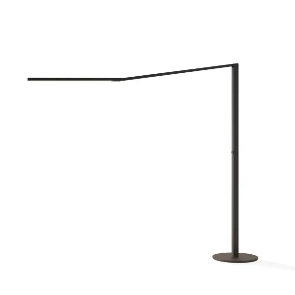 The Z-Bar Titan floor lamp is a testament to how elegance and functionality can coexist. Despite its impressive size, with a width of 78" and a height that can reach up to 84", the lamp delivers unmatched flexibility. A smart internal mechanism allows for feather-light adjustability, enabling users to reposition the lamp with just one finger. The rotatable LED head lets users switch between downlight and uplight, while the entire fixture rotates at the base for added versatility. This combination of scale and precision makes the Z-Bar Titan both a commanding presence and a highly adaptable lighting solution, ideal for those who appreciate refined design with maximum functionality. Its slender and minimalist silhouette ensures a seamless integration into any interior, making it a coveted addition to any discerning individual's decor. The lamp's subtle rotary switch allows for effortless brightness control, creating a seamless lighting experience that effortlessly adapts to your needs. Experience the perfect blend of style, functionality, and versatility with the Z-Bar Titan floor lamp, your ultimate lighting solution for any space. Collection: Z-Bar Gen 4 Designer: Peter Ng, Keneth Ng, Edmund Ng Finish: Matte Black Width: 16.00" Height: 67.50" Length: 78.00" Weight: 32.00 lb Maximum Wattage: 26.00 W Bulb Type: LED Bulb Base: Integrated Light Source: LED Light Output: 1600.00 lm Color Temperature: 3000 K CRI: 90 Voltage: 100.00 V Material: Aluminum, steel, plastic Country of Origin: China Safety Listing: UL/cUL LED Manufacturer Warranty: 5 years Spec Sheet
