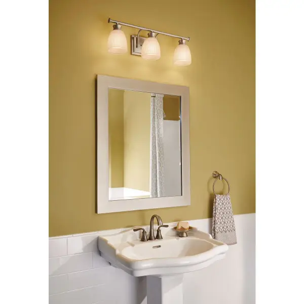 The Lucky Collection brings coastal elegance to bathroom lighting with three lights and a versatile brushed nickel finish. JA8 compliant for California energy standards, this vanity fixture balances style and functionality. - alternate view