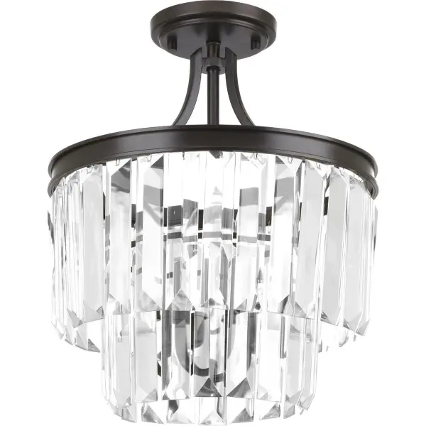 The Glimmer Collection offers sophisticated lighting with a versatile semi-flush design that can convert to pendant style. Its Silver Ridge finish and three-light configuration provide ample illumination while maintaining a refined aesthetic.