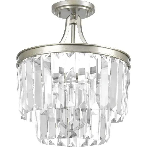 The Glimmer Collection offers sophisticated lighting with a versatile semi-flush design that can convert to pendant style. Its Silver Ridge finish and three-light configuration provide ample illumination while maintaining a refined aesthetic. - alternate view