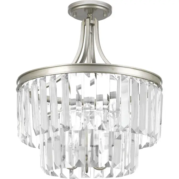 The Glimmer Collection offers sophisticated lighting with a sleek Silver Ridge finish and convertible mounting options. Perfect for spaces with standard ceiling heights, this three-light fixture delivers ample illumination with contemporary style.