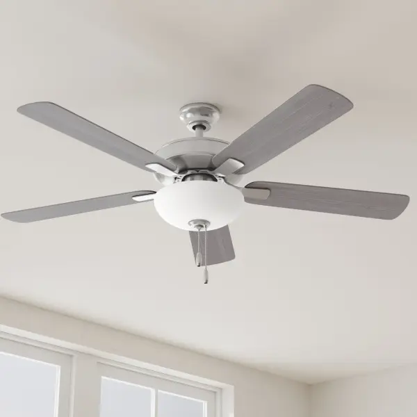 The AirPro combines efficient AC motor performance with integrated lighting in a clean transitional design. Its 52-inch blade span and brushed nickel finish make it ideal for medium to large residential spaces.