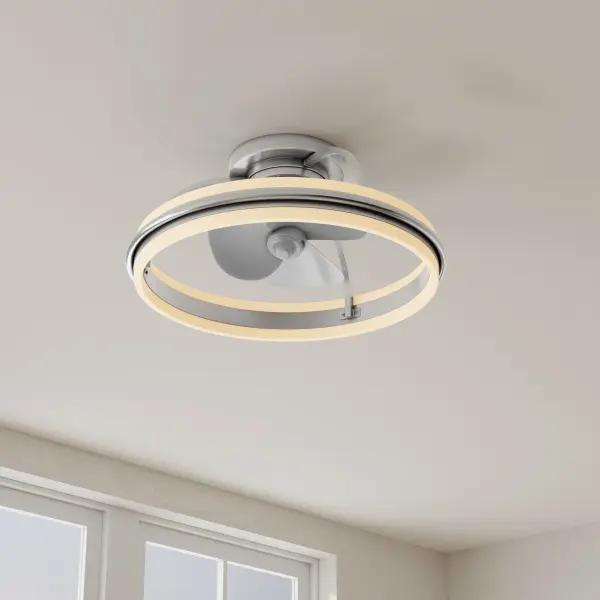 The Burnett ceiling fan brings unique oscillating functionality to modern spaces with its three-blade design and brushed nickel finish. JA8-compliant and suitable for both indoor and outdoor use, it combines industrial style with practical airflow. - alternate view