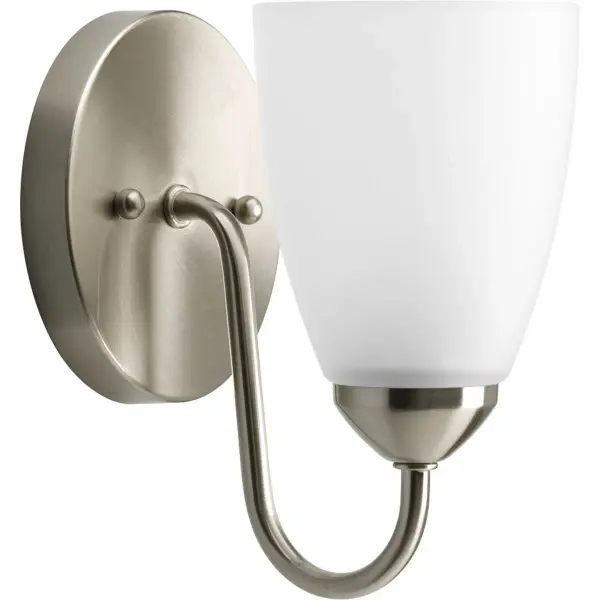 The Gather Collection offers timeless traditional styling with a brushed nickel finish and etched glass shade. Perfect for smaller bathrooms and powder rooms, this single-light fixture provides soft, even illumination.