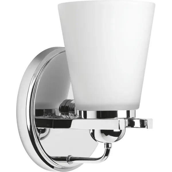 The Flight Collection brings breezy coastal elegance to bathroom lighting with its etched glass shade and brushed nickel finish. This single-light fixture offers soft, diffused illumination perfect for powder rooms and smaller vanities.