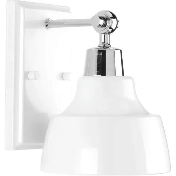The Bramlett vanity light combines farmhouse charm with coastal elegance, featuring a sleek metal shade in polished chrome. Perfect for bathrooms and powder rooms, this single-light fixture offers JA8 compliance and versatile styling.