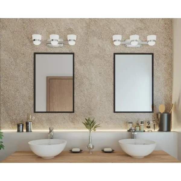 The Index Collection brings contemporary sophistication to bathroom lighting with its sleek three-light design. Brushed nickel finish and glass shades create a refined look perfect for modern bathrooms. - alternate view