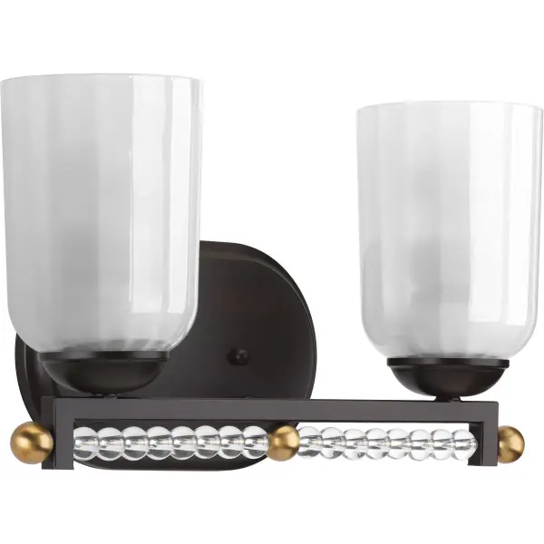 The Carlyn Collection brings traditional elegance to bathroom lighting with its two-light configuration and warm Antique Bronze finish. JA8 compliant for California energy standards, this vanity fixture delivers both style and efficiency.