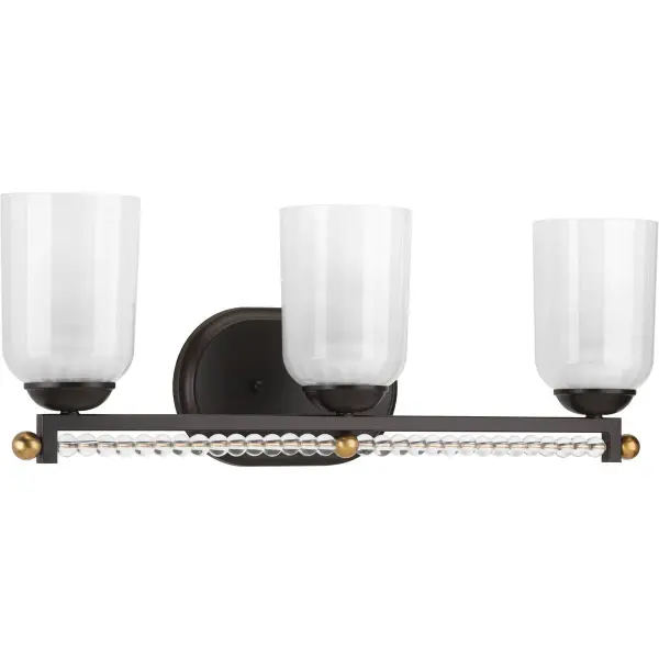 The Carlyn Collection brings sophisticated transitional style to bathroom lighting with its three-light configuration and warm Antique Bronze finish. JA8 compliant for California energy standards, this vanity fixture balances traditional elegance with modern efficiency.