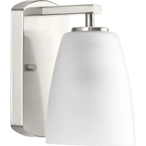 The Leap Collection delivers clean, contemporary styling with its brushed nickel finish and etched glass shade. Perfect for modern bathrooms, this single-light fixture provides soft, even illumination ideal for grooming tasks. - alternate view