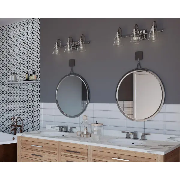 The Litchfield three-light vanity fixture brings coastal elegance to bathroom spaces with polished chrome finish and clear glass cylinders. JA8 compliant for California energy standards, ideal for modern coastal homes. - alternate view